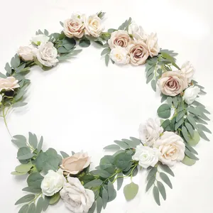Macro detail of cream and champagne rose garland with realistic eucalyptus leaves