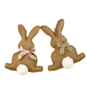 Lot de 2 lapins de Pâques en toile de jute avec pompons et nœuds papillon fleuris