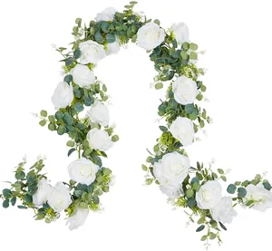 Detailed view of white rose and eucalyptus garland for wedding arch decoration