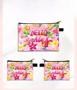 Front and back detail of floral storage bag with Hello Spring print and metal zipper