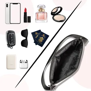 Interior view of large leopard print felt bag showing spacious storage for daily items