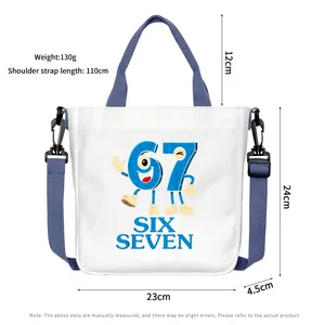 White canvas tote bag with blue 67 print showing dimensions and adjustable strap