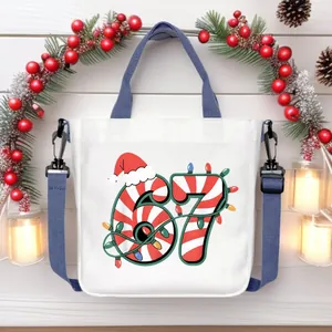 Holiday themed canvas crossbody bag featuring festive number 67 print with Christmas accents