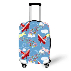 Detail of blue elastic suitcase cover with colorful airplane and gift box patterns