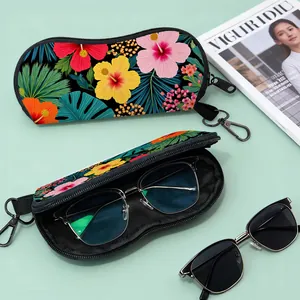 Portable floral print sunglasses case with tropical hibiscus pattern and metal hook