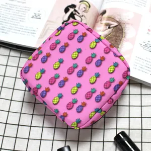 Portable pink storage bag with pineapple patterns on a minimalist aesthetic background