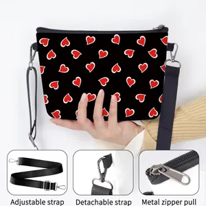 Winter floral print crossbody tote with adjustable shoulder strap and metal zipper