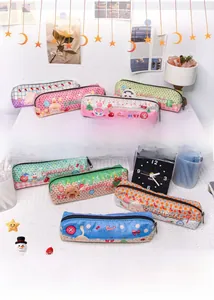 Close-up of cute animal plush pencil cases in multiple colors with cartoon patterns