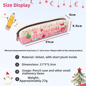 Detail of pink plush unicorn pencil case showing festive graphics and soft fabric texture