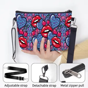 Women's shoulder bag with pop art print, adjustable strap and metallic zipper detail