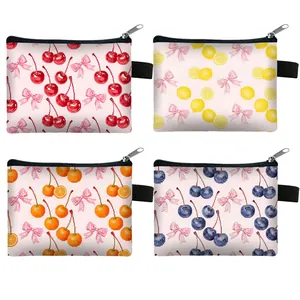 Detailed grid view of mini coin purses with pixel art fruit patterns and zipper closure
