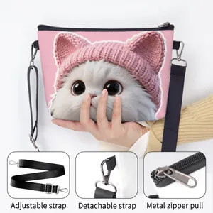 Pink crossbody bag with cute cat print, adjustable wide strap and metal zipper