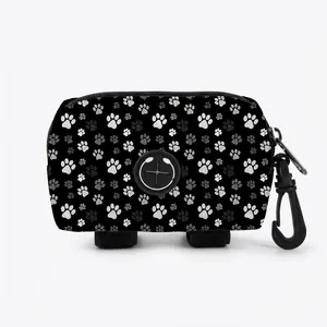 Black pet waste bag dispenser with paw prints, featuring a rubber outlet and hooks