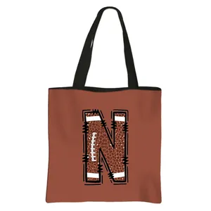 Bruine polyester shopper met American football-letter N en stevig zwart handvat