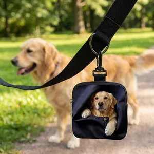 Detail of a black portable dog treat bag with Golden Retriever print and hook