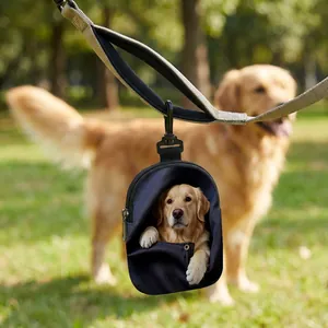 Detail of pet treat pouch featuring golden retriever print and durable swivel hook
