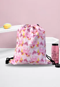 Detail of pink unicorn drawstring gift bag featuring hearts and durable polyester fabric