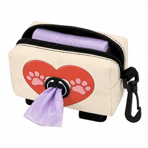 Canvas dog poop bag dispenser with heart and paw prints, featuring a hook and zip closure
