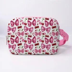 Cute white waist bag with pink cherry and bow patterns and adjustable strap