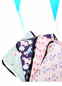 Detail view of colorful polyester drawstring backpacks with various cartoon unicorn prints