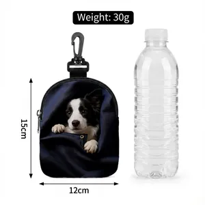 Detail showing portable dog treat bag with border collie print next to water bottle