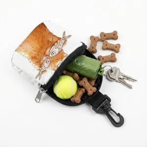 Close-up of portable dog treat pouch with cat illustration and training accessories