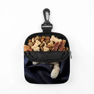 Portable pet treat bag with creative paw print and dog food for outdoor training