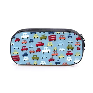 Trousse bleue en toile avec motifs de véhicules de chantier et fermeture éclair