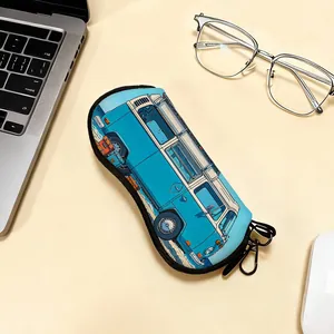 Close-up of portable zipper sunglasses case with a vintage blue camper van print
