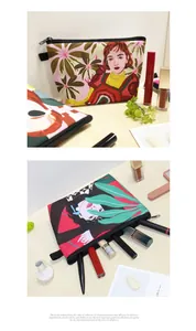 Detailed macro view of the printed canvas makeup bag with zipper closure and artistic design