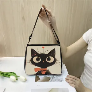 Minimalist black cat canvas tote bag with adjustable strap and artistic cat illustration