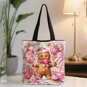 Christmas tote bag with gingerbread man illustration on a white table in cozy setting