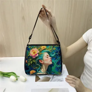Artistic tote bag with floral portrait illustration and adjustable black strap