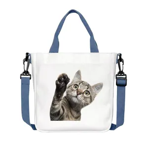 Large capacity canvas tote bag with cute cat print and adjustable blue shoulder strap