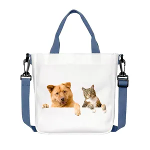 White canvas crossbody bag with dog and cat print, dual handles, and large capacity