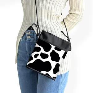 Leopard and cow print crossbody phone bag with adjustable rope strap for daily travel