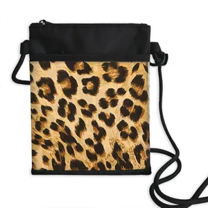 Leopard print crossbody phone bag with black nylon patchwork and adjustable strap