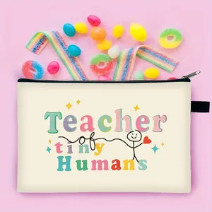 Close-up of Teacher of tiny Humans canvas makeup bag with cute colorful prints