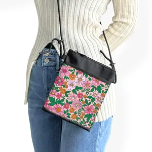 Vintage floral mini crossbody phone bag with black trim and adjustable strap for women