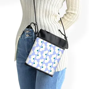 Vintage floral mini crossbody phone bag with white flower pattern on black fabric