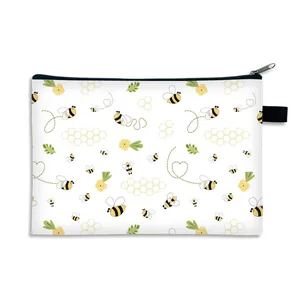 Cute bee canvas makeup bag with cartoon honeybee pattern and black zipper closure