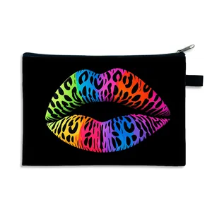 Black canvas makeup bag with vibrant leopard print lip pattern and silver zipper