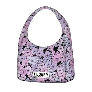 Bolso tote de lona con estampado de flores moradas y asa integrada para uso diario