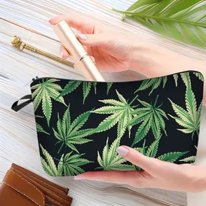 Large capacity polyester makeup bag with palm leaf patterns shown in a lifestyle setting