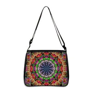 Detail of crossbody bag with vibrant colorful mandala pattern and adjustable strap