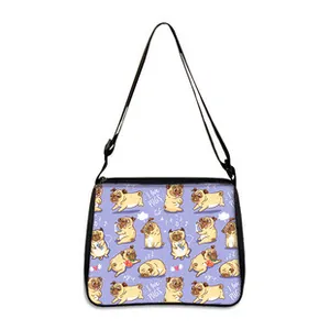 Detail view of purple crossbody bag with cute pug prints and adjustable black shoulder strap
