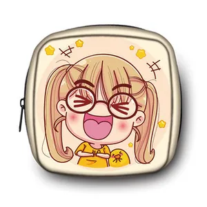 Close-up of a square canvas coin purse with a cute cartoon girl and yellow duck print