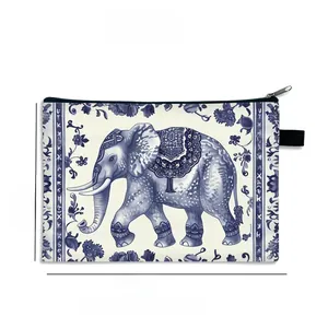 Detail view of elephant print travel bag showing 21x15cm dimensions and blue floral pattern