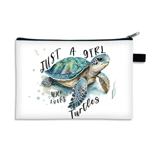Foldable canvas makeup bag featuring watercolor turtle print and top zipper closure