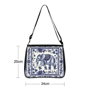 Retro elephant crossbody bag with blue porcelain floral print and 24cm width
